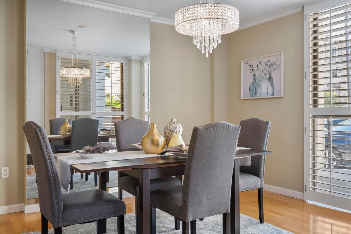 110 Park Road, Unit 103 Burlingame, CA 94010 - Photo 9 of 48 a view of a dining room with furniture window and wooden floor