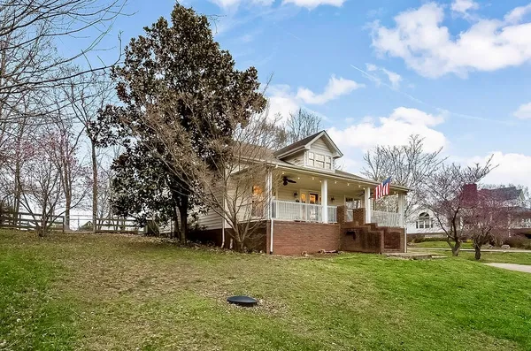a view of house with outdoor space