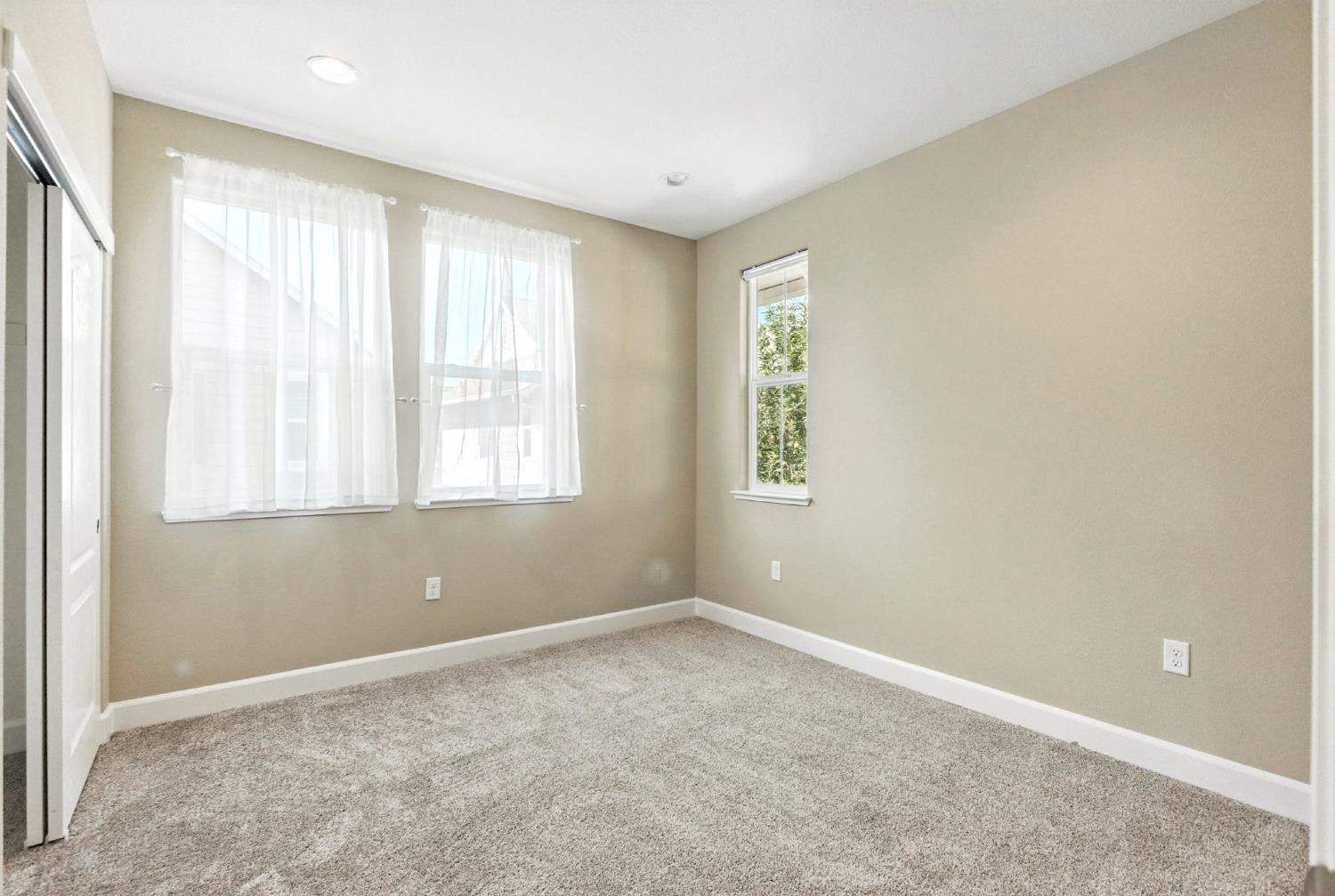 2248 Cannery Loop Davis, CA 95616 - Photo 25 of 34 a view of an empty room with a window