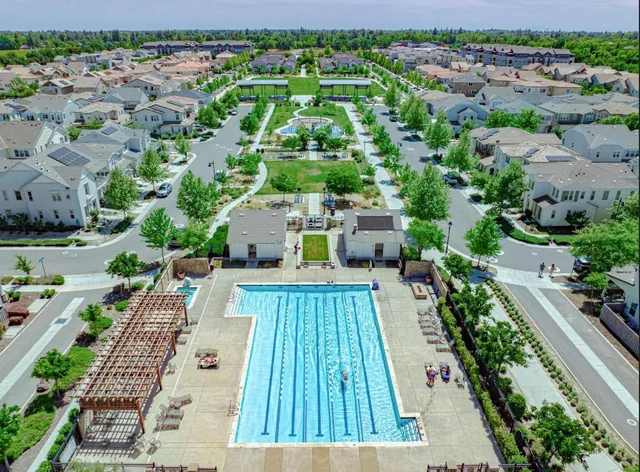 an aerial view of residential building with outdoor space