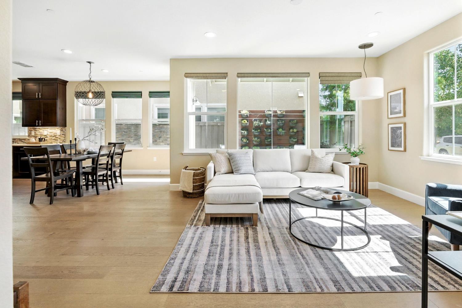 2248 Cannery Loop Davis, CA 95616 - Photo 4 of 34 a living room with furniture and a large window