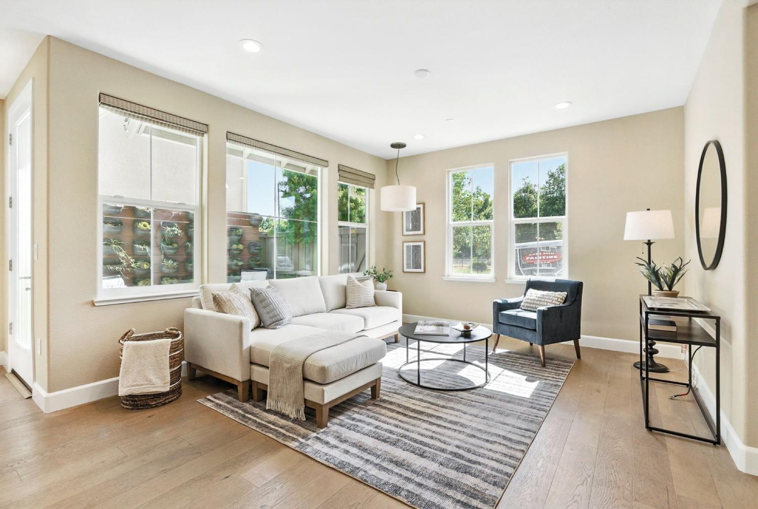 2248 Cannery Loop Davis, CA 95616 - Photo 5 of 34 a living room with furniture and a large window