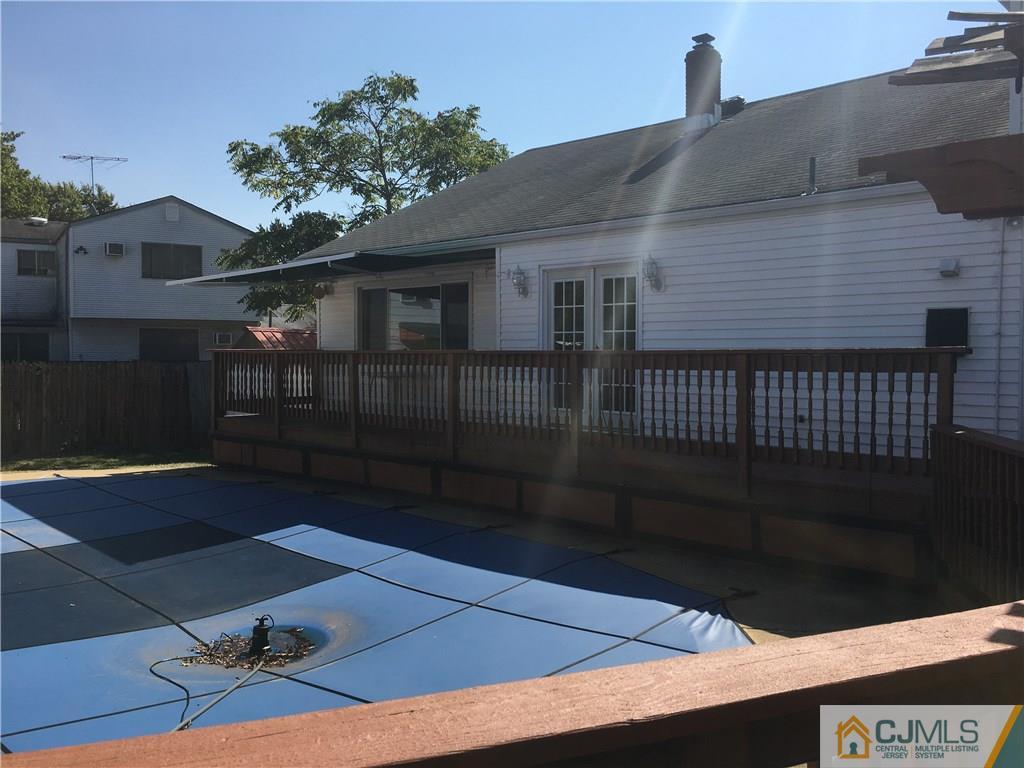 33 Back Drive Edison, NJ 08817 - Photo 24 of 25 a backyard of a house