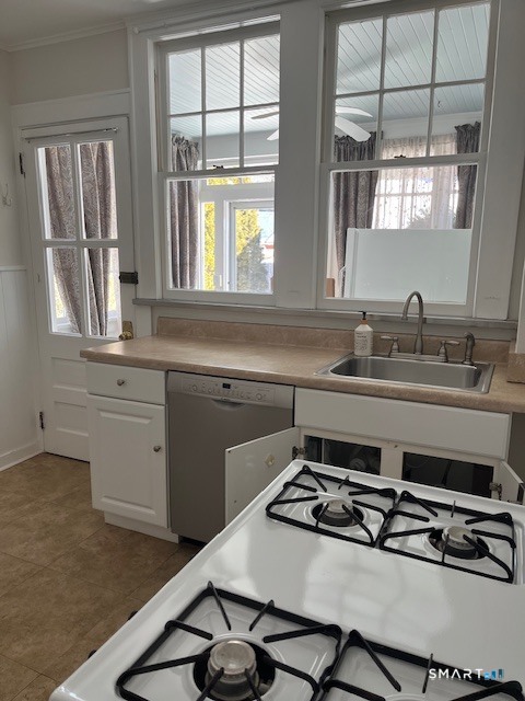 1426 Stratfield Road Fairfield, CT 06825 - Photo 7 of 18 Charming Kitchen Also leads to the Lower Level Basement for your Washer & Dryer.