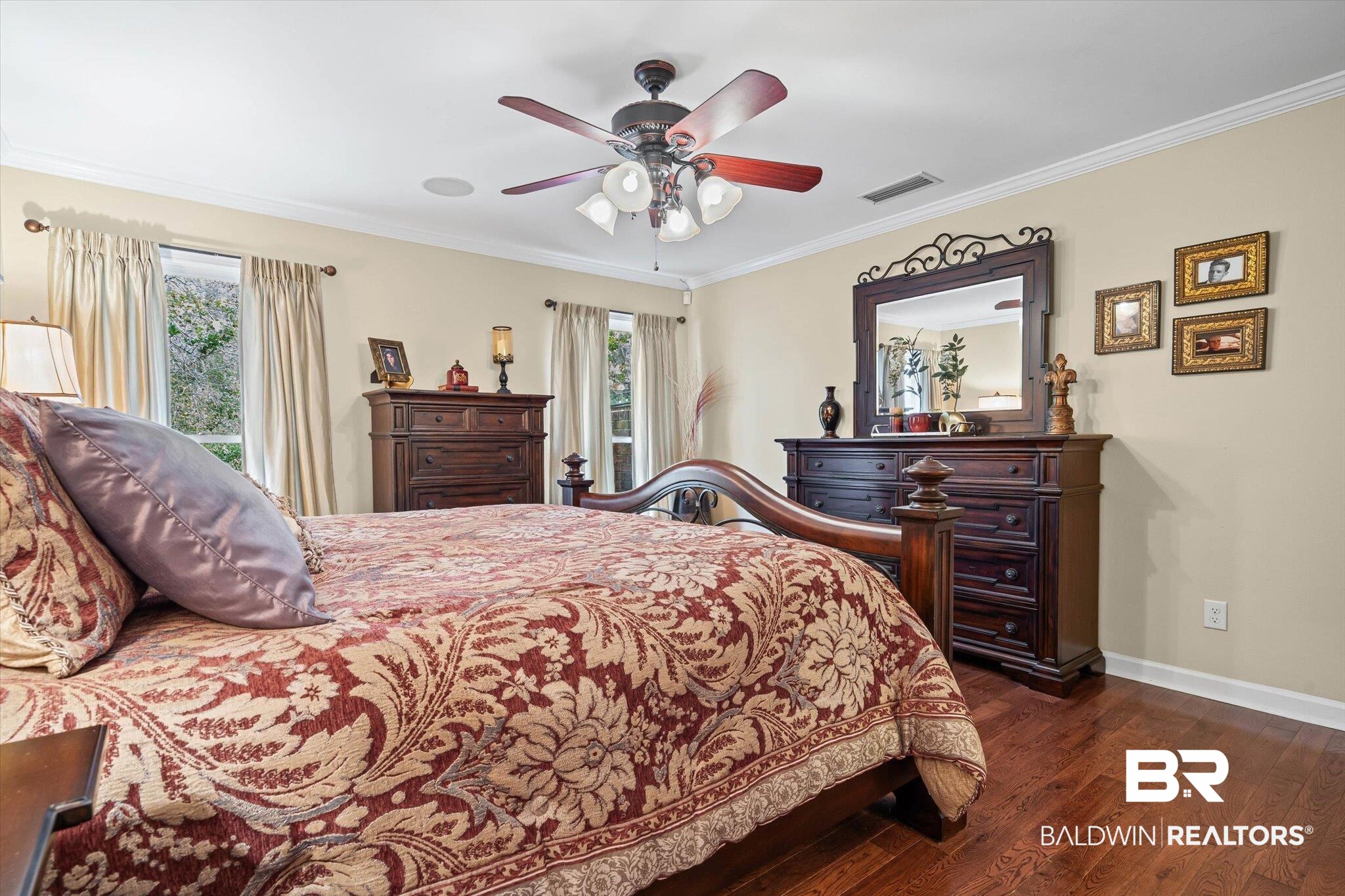 1517 Ridgeland Road East Mobile, AL 36695 - Photo 15 of 39 Bedroom featuring ornamental molding, dark wood finished floors, and a ceiling fan and private bath