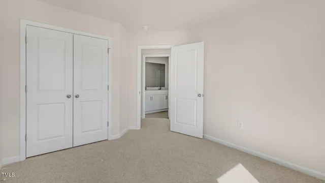 an empty room with closet