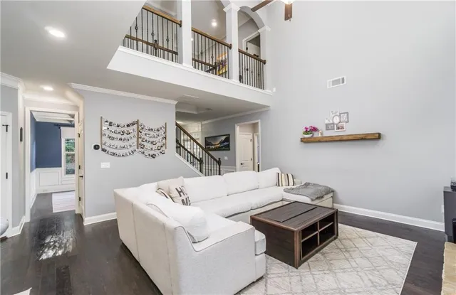 a living room with furniture and a table