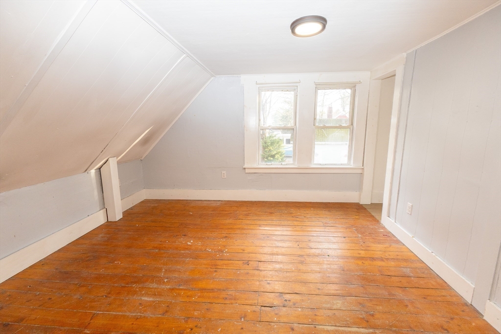 958 Center Street Middleboro, MA 02346 - Photo 11 of 17 a view of an empty room with wooden floor and a window