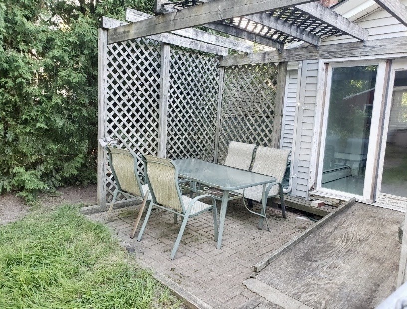 958 Center Street Middleboro, MA 02346 - Photo 16 of 17 a view of a chairs and table in backyard