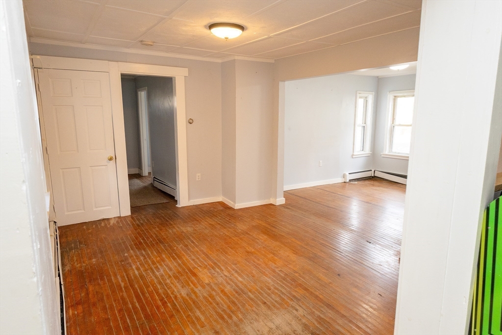 958 Center Street Middleboro, MA 02346 - Photo 5 of 17 a view of empty room with wooden floor