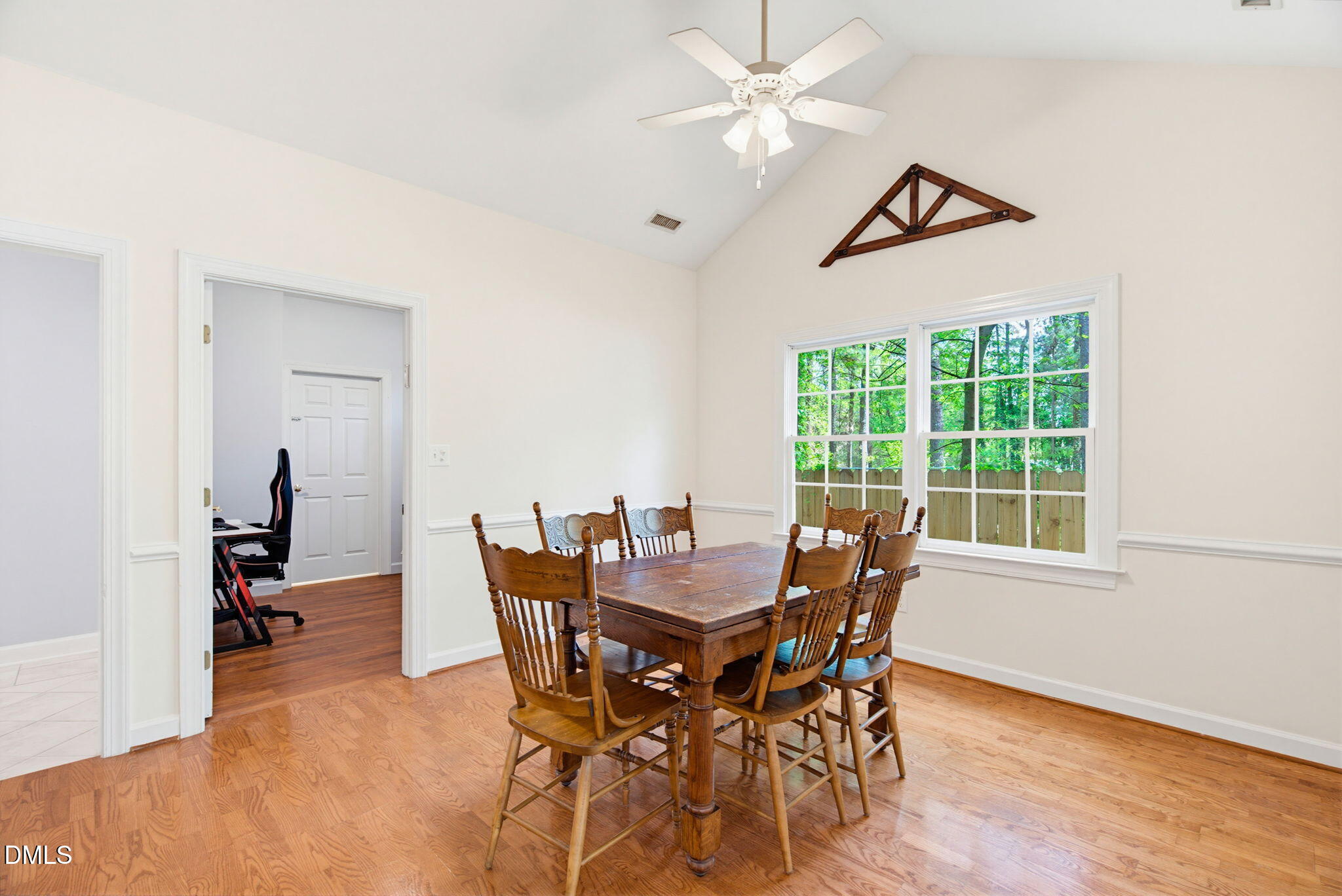2533 Big Sky Lane Raleigh, NC 27615 - Photo 11 of 40 a view of a dining room with furniture window and wooden floor