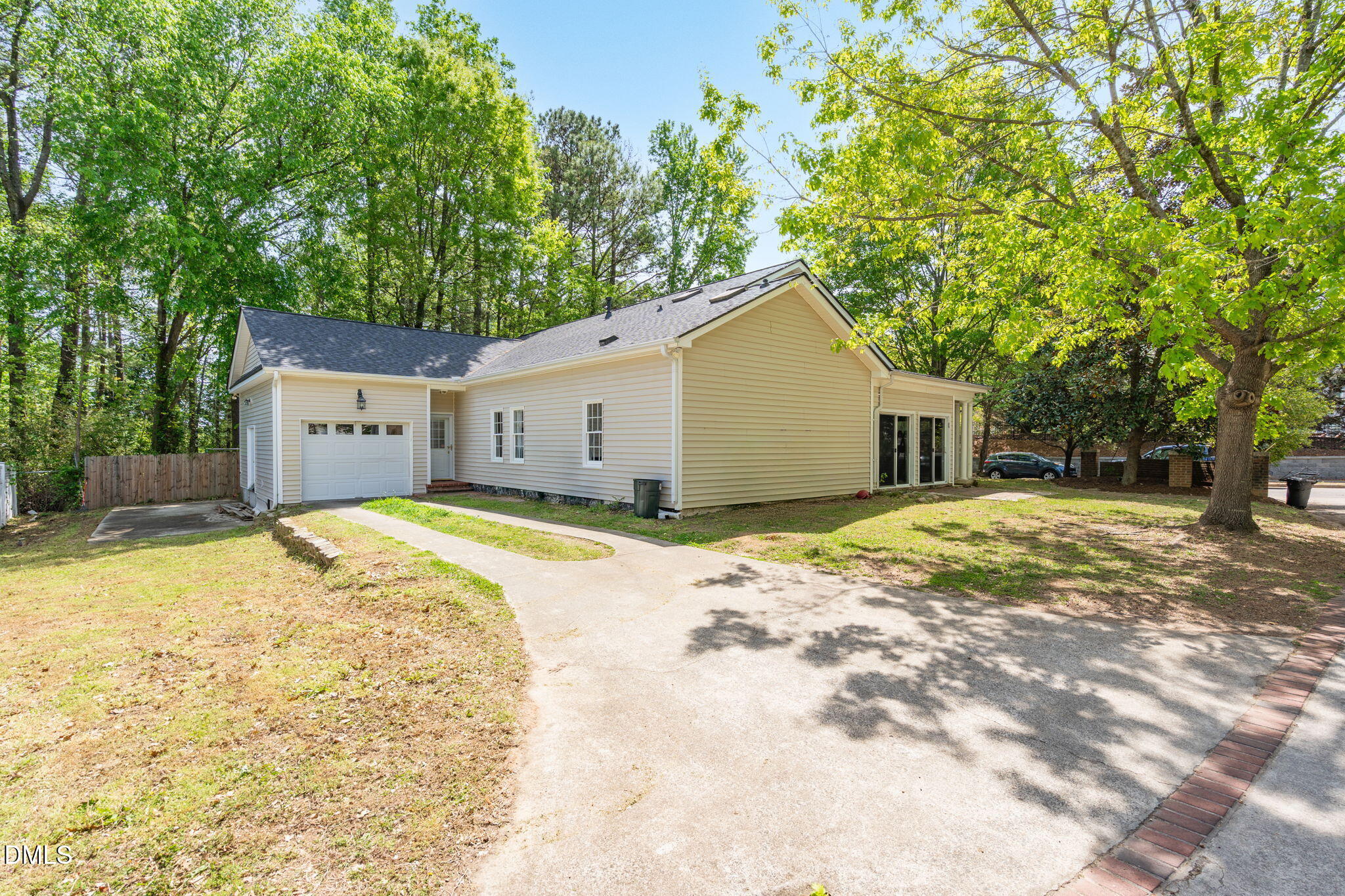 2533 Big Sky Lane Raleigh, NC 27615 - Photo 31 of 40 a view of a white house with a yard