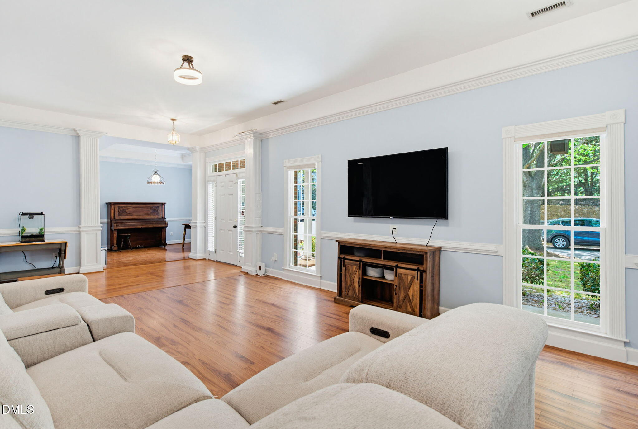 2533 Big Sky Lane Raleigh, NC 27615 - Photo 5 of 40 a living room with fireplace furniture and a flat screen tv