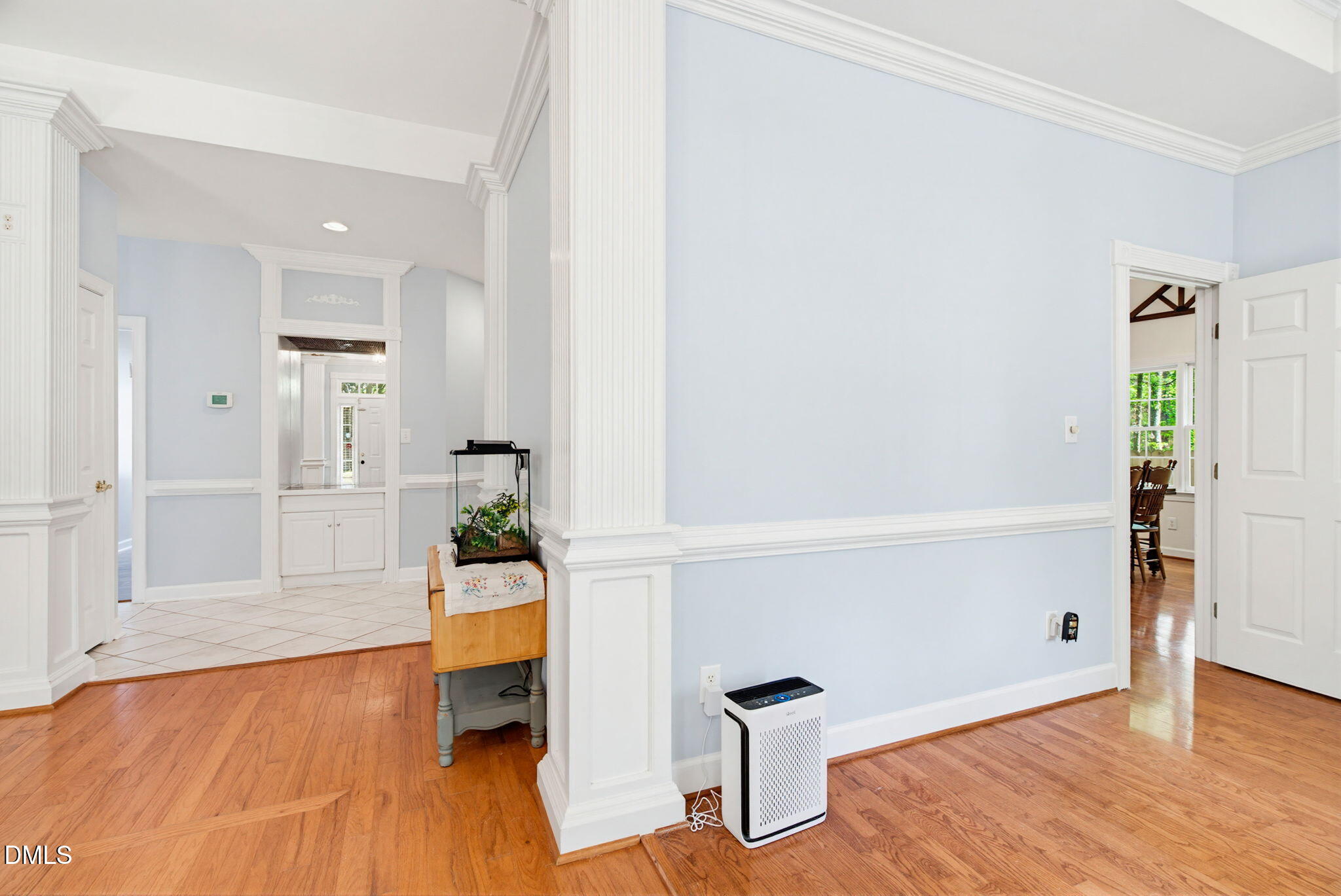 2533 Big Sky Lane Raleigh, NC 27615 - Photo 8 of 40 a view of an entryway with wooden floor and a livingroom