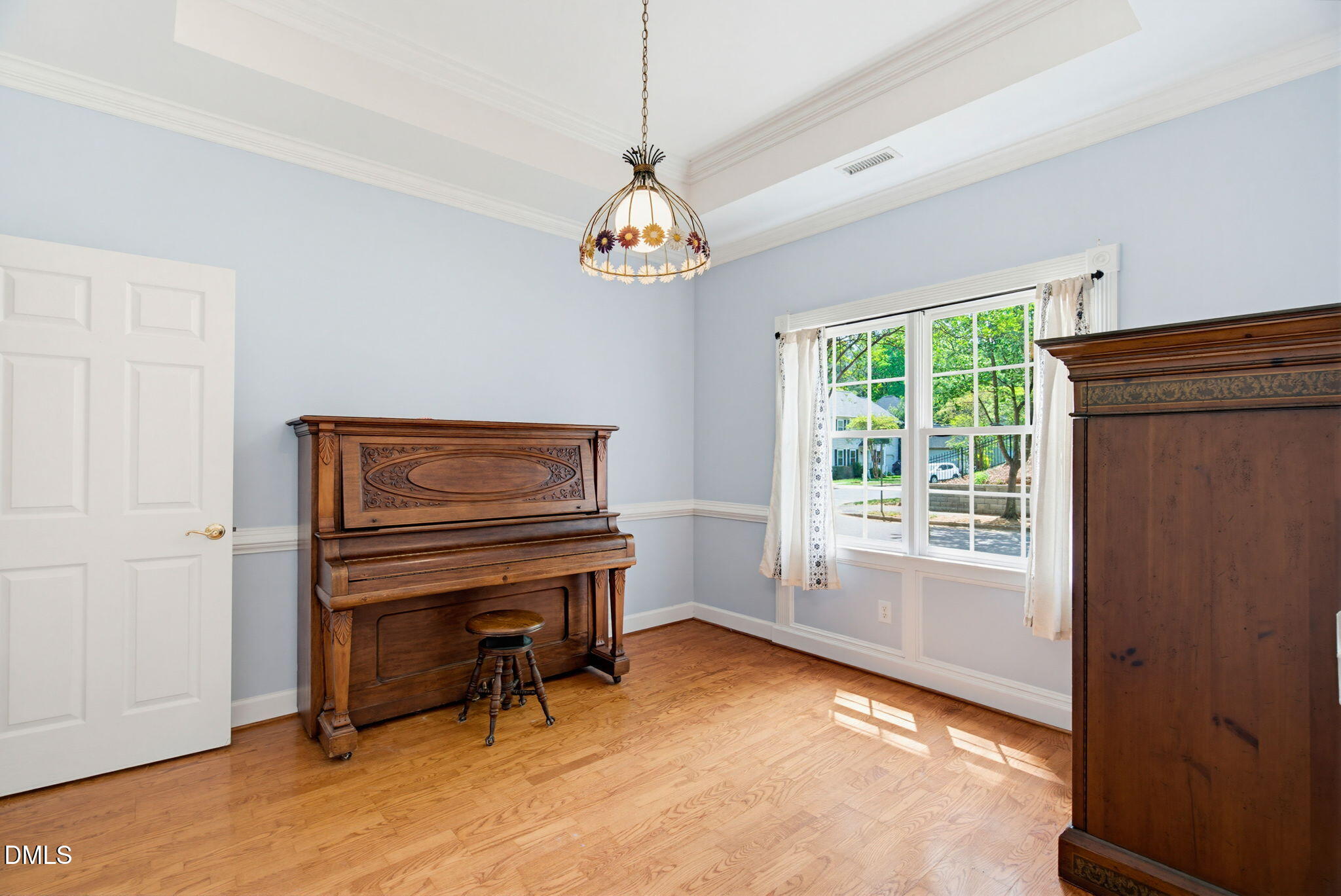 2533 Big Sky Lane Raleigh, NC 27615 - Photo 9 of 40 a view of an empty room with a window and furniture