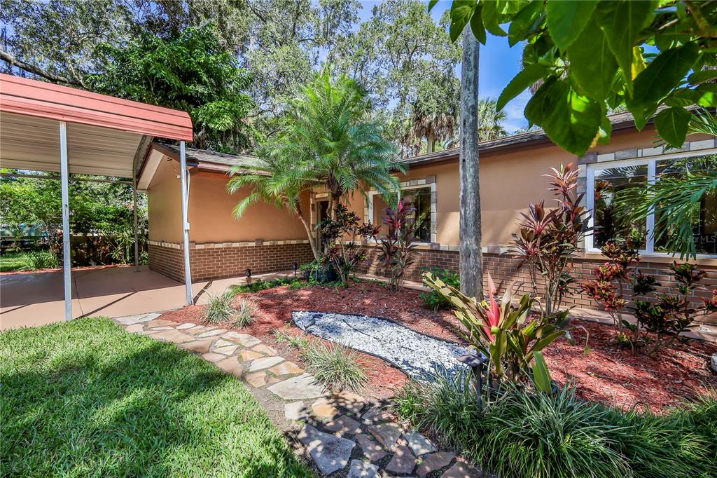 a backyard of a house with lots of green space