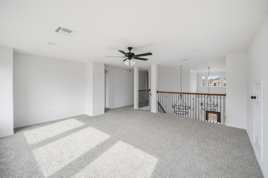 16511 Boston Post Road Cypress, TX 77429 - Photo 24 of 46 a view of a livingroom with a ceiling fan