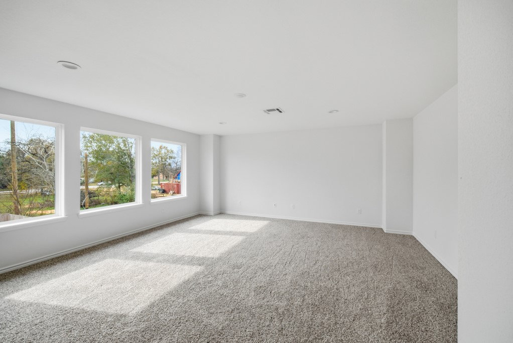 16511 Boston Post Road Cypress, TX 77429 - Photo 26 of 46 an empty room with windows