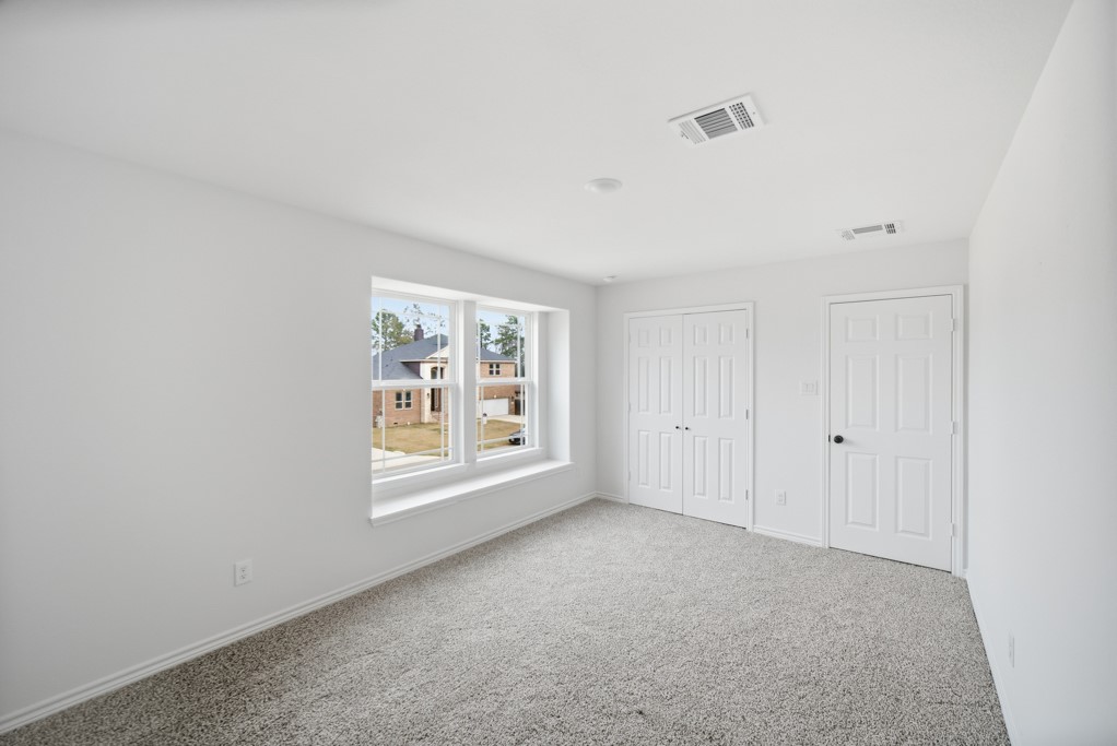 16511 Boston Post Road Cypress, TX 77429 - Photo 30 of 46 a view of an empty room with a window