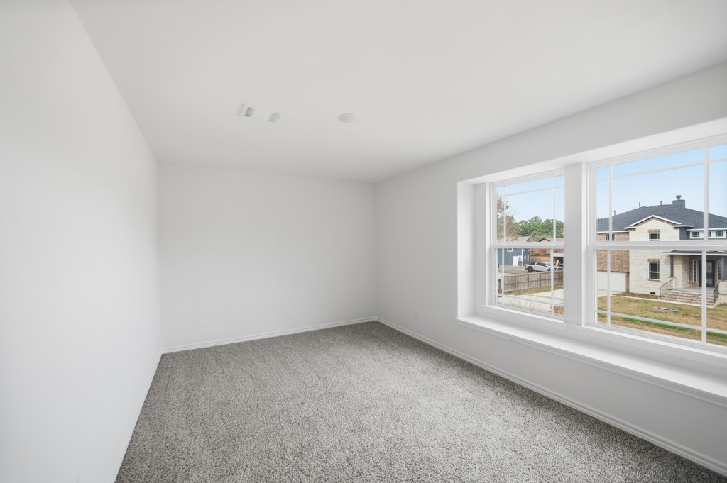 16511 Boston Post Road Cypress, TX 77429 - Photo 32 of 46 an empty room with a window