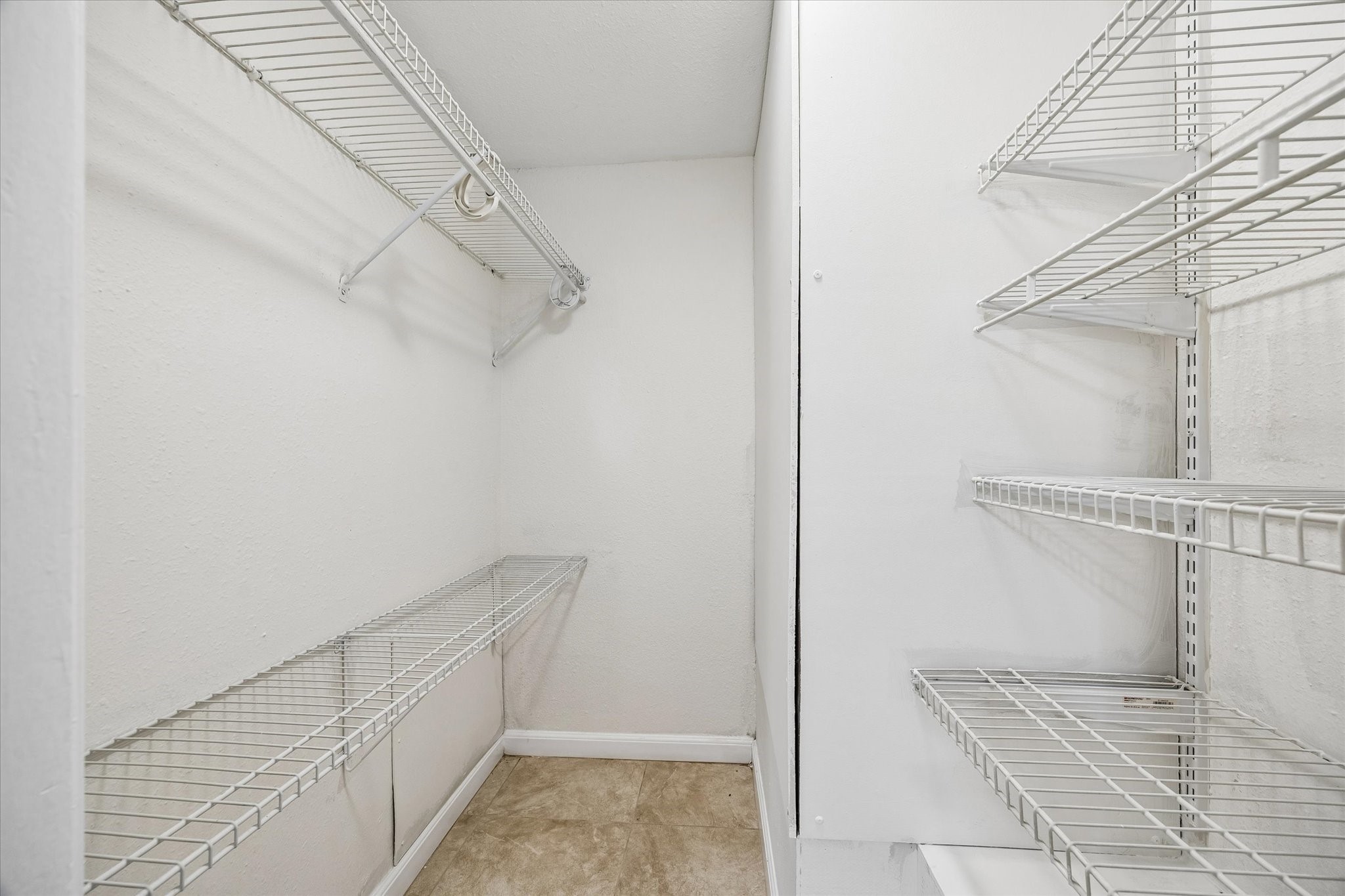 2206 Mason Street, Unit 7 Houston, TX 77006 - Photo 11 of 11 a view of a room with racks on the wall