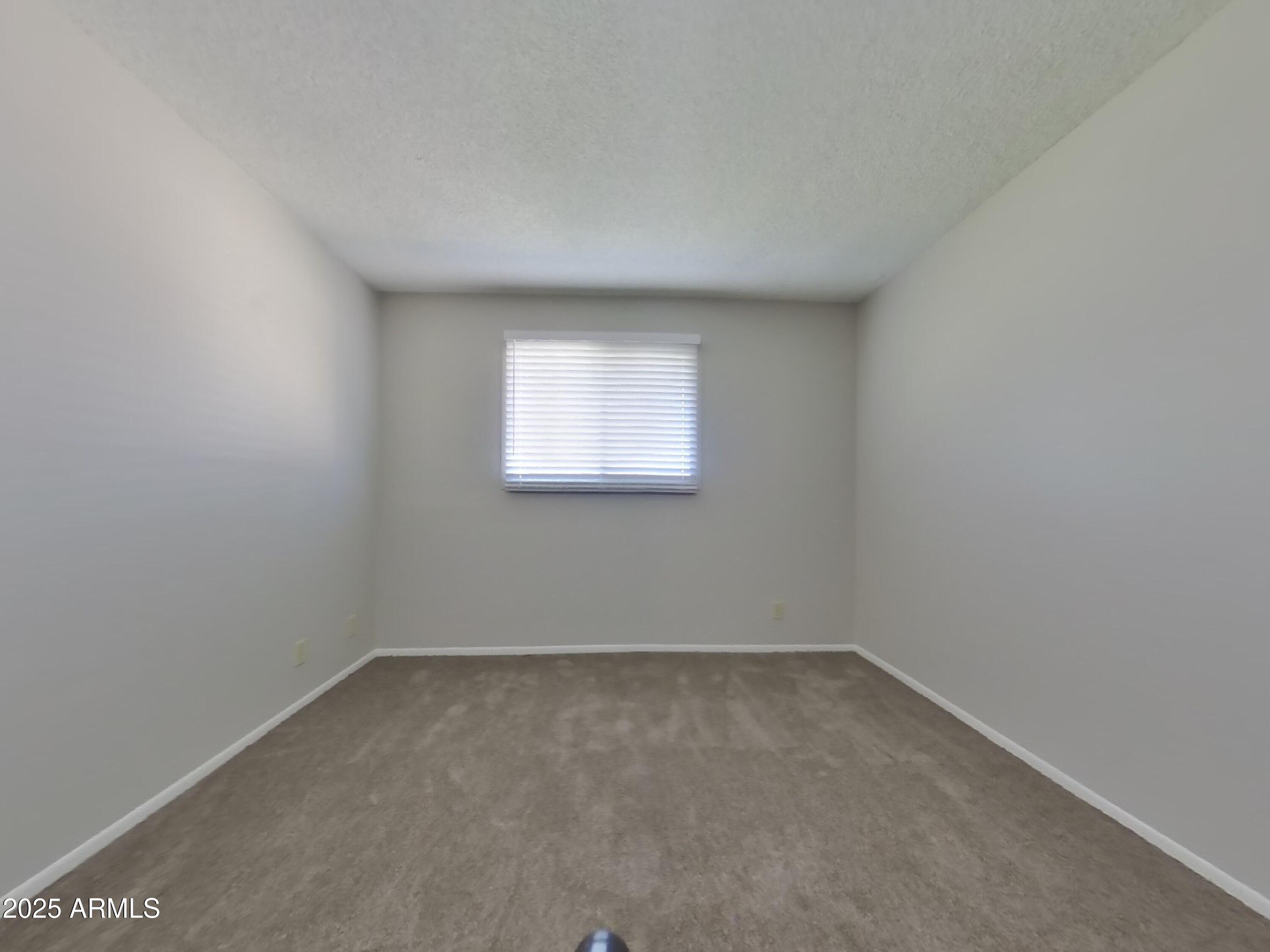 5025 South Mill Avenue Tempe, AZ 85282 - Photo 14 of 18 an empty room with a window