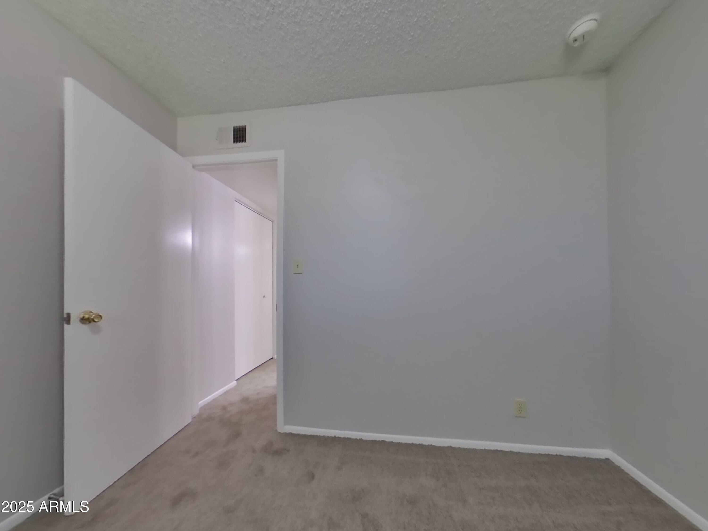 5025 South Mill Avenue Tempe, AZ 85282 - Photo 5 of 18 a view of an empty room