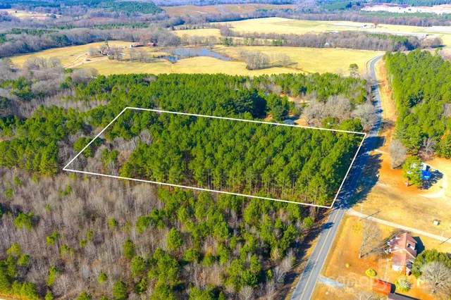 a view of a swimming pool and outdoor space