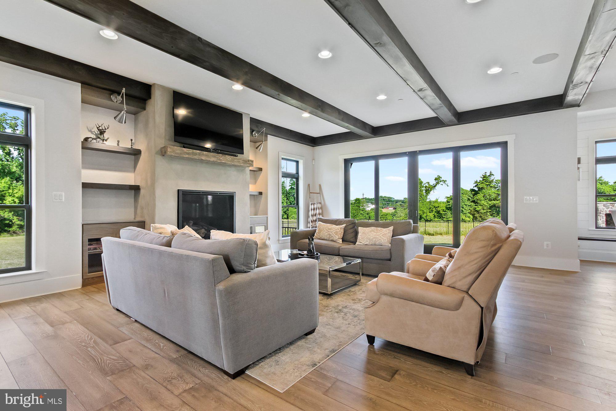 2033 Connolly Road Fallston, MD 21047 - Photo 17 of 49 a living room with furniture fireplace and flat screen tv