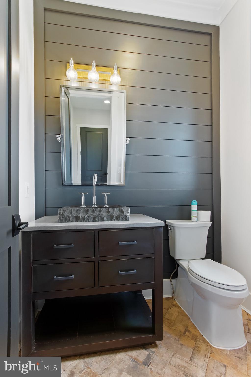 2033 Connolly Road Fallston, MD 21047 - Photo 24 of 49 a bathroom with a toilet a sink and mirror