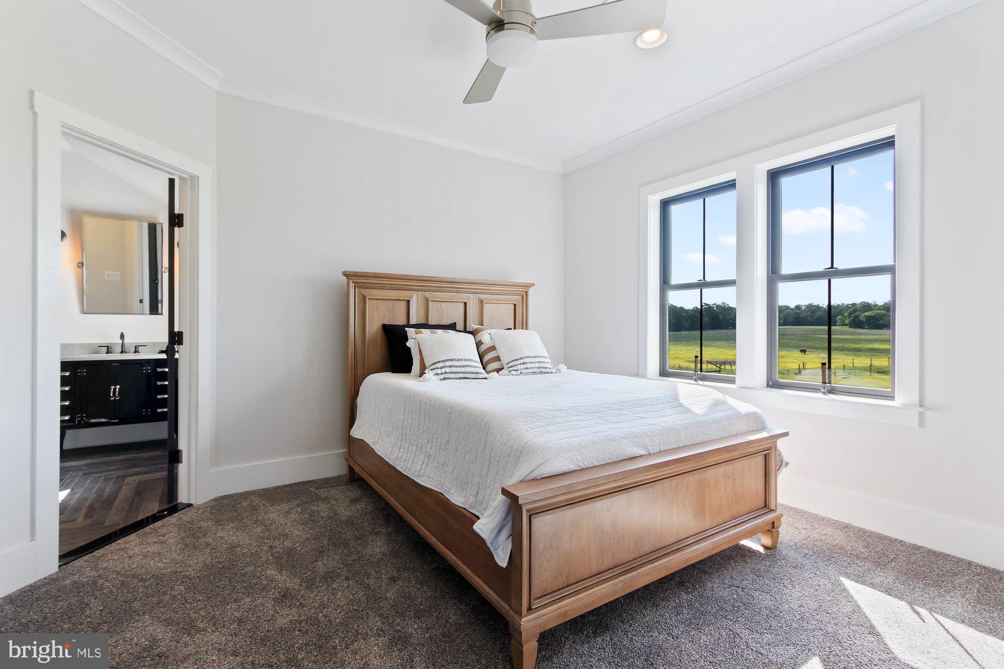 2033 Connolly Road Fallston, MD 21047 - Photo 35 of 49 a bed sitting in a bedroom next to a window