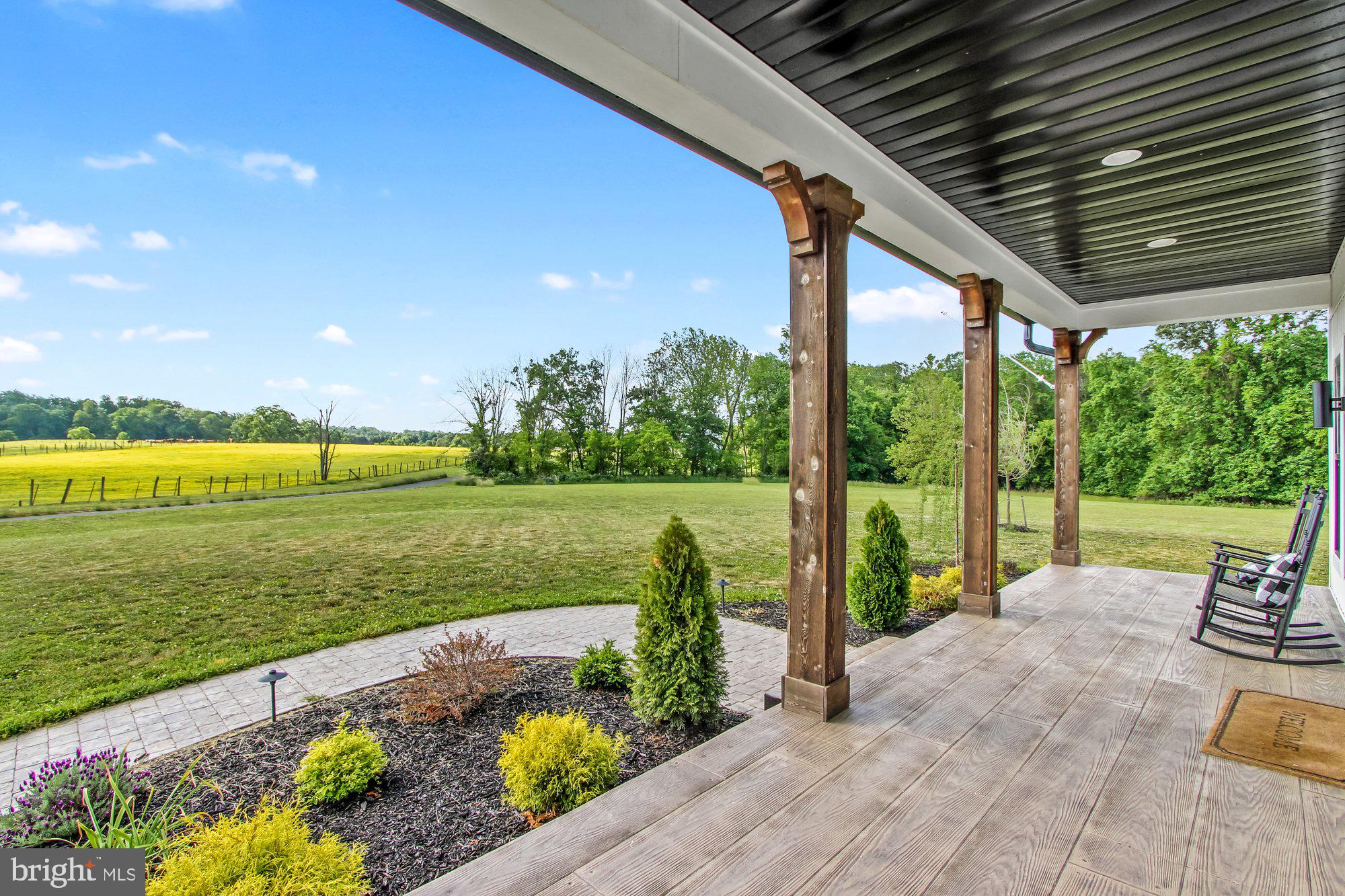2033 Connolly Road Fallston, MD 21047 - Photo 5 of 49 a view of a patio with a table chairs and a swimming pool