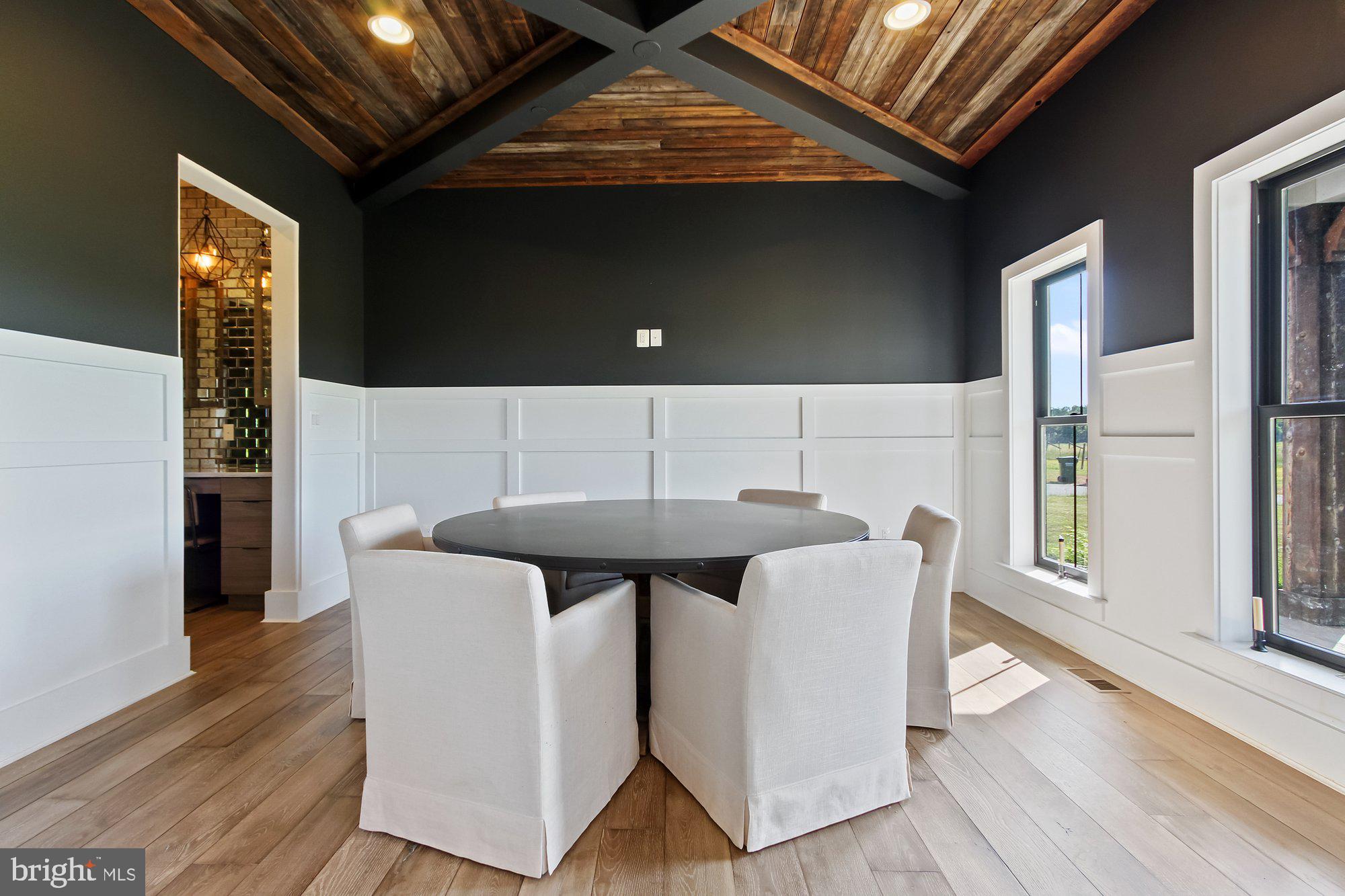 2033 Connolly Road Fallston, MD 21047 - Photo 10 of 49 a roof deck with table and chairs