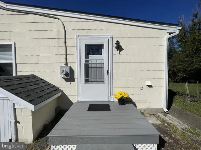 a bedroom with a bed and a fireplace