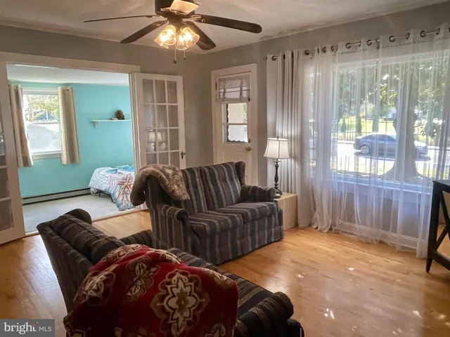 a bedroom with furniture and a fireplace