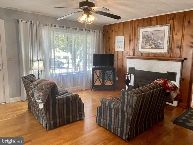 a white refrigerator freezer sitting inside of a kitchen