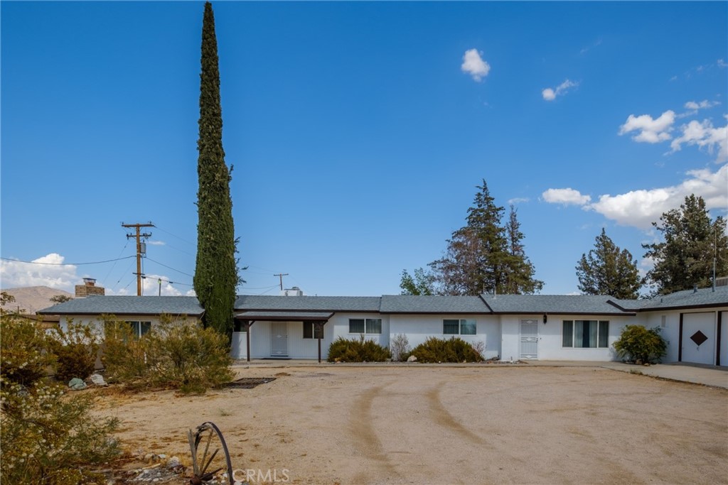 11085 Chipmunk Road Apple Valley, CA 92308 - Photo 1 of 1 a view of a house with a patio