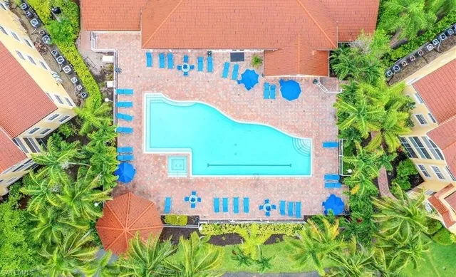 an aerial view of residential houses and city street