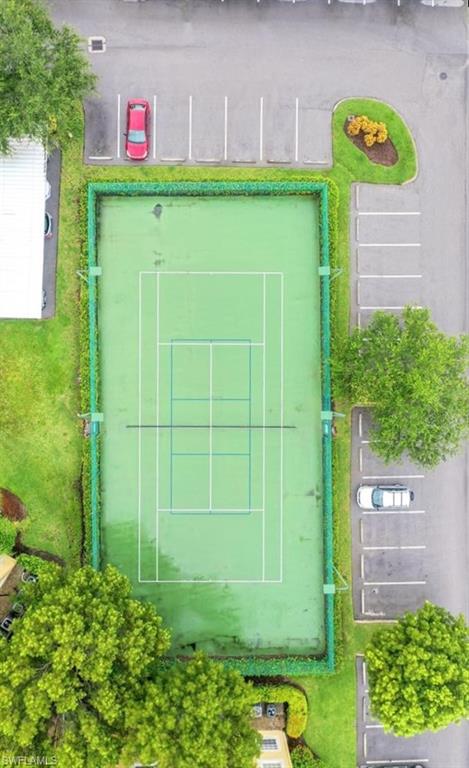 4635 St Croix Lane, Unit 1215 Naples, FL 34109 - Photo 21 of 22 a view of a back yard