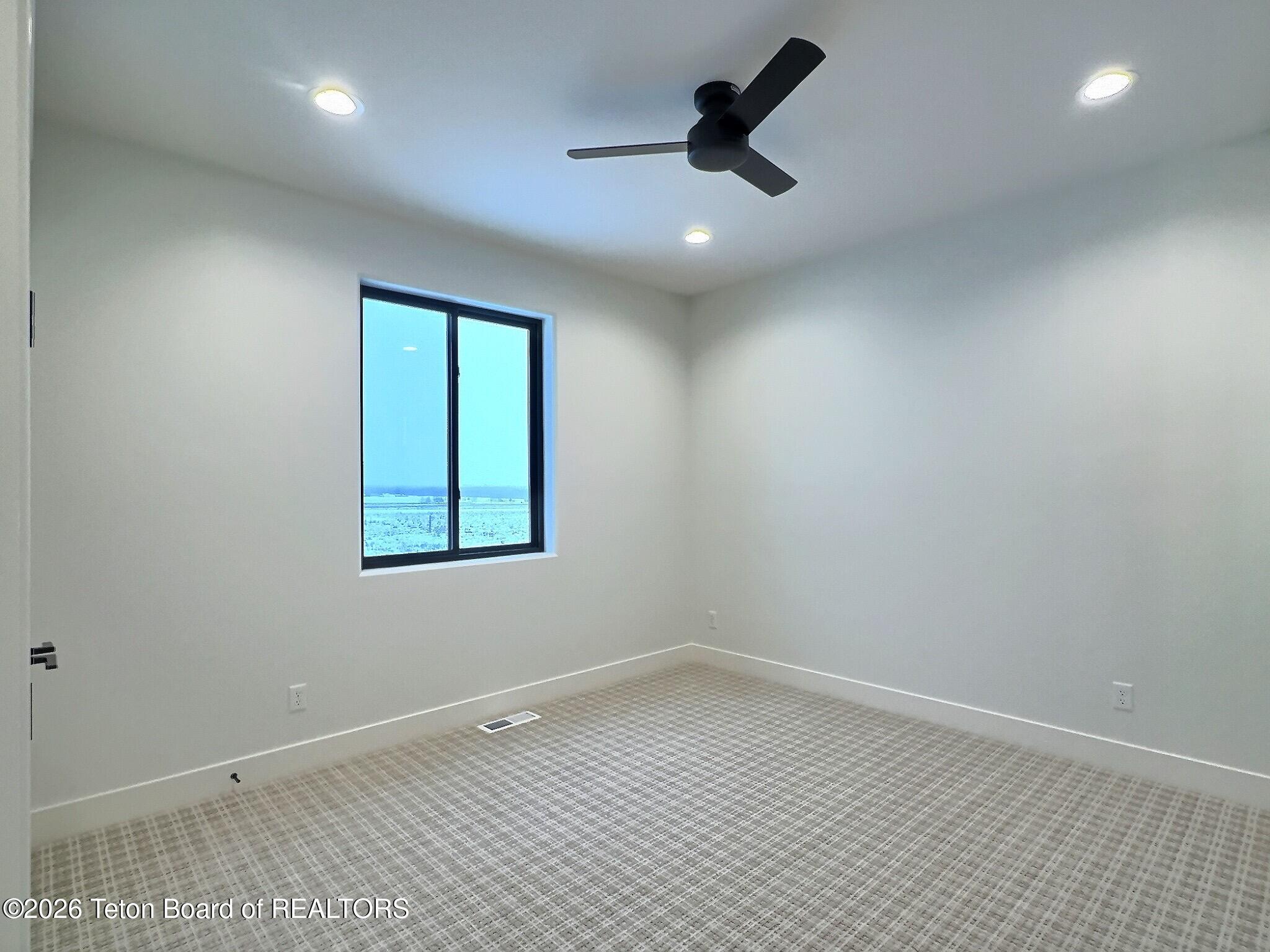 443 Royal Elk Circle Victor, ID 83455 - Photo 32 of 58 Main Floor Bedroom 3