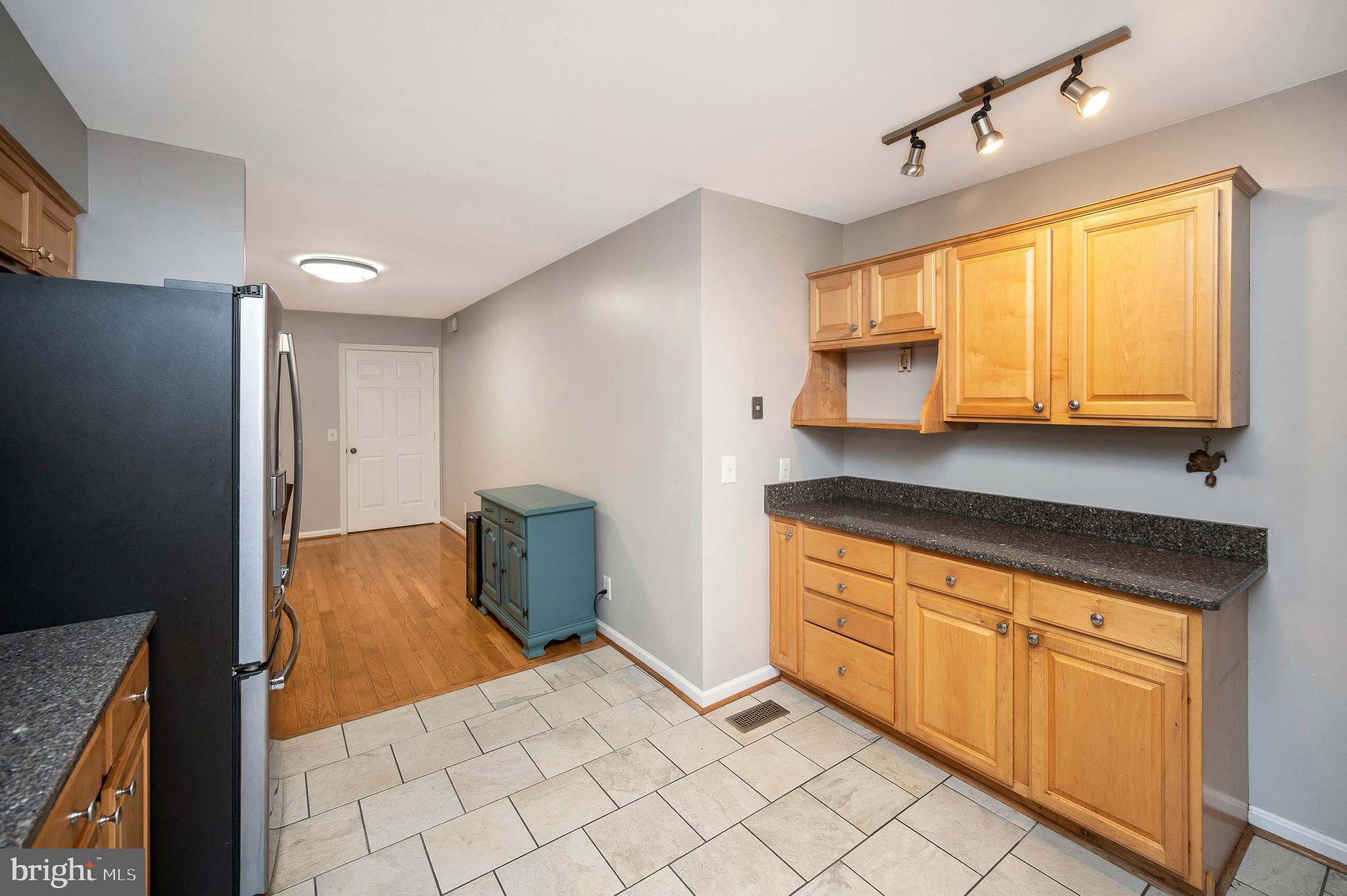 679 Cropp Road Fredericksburg, VA 22406 - Photo 19 of 39 a bedroom with a bed and cabinets