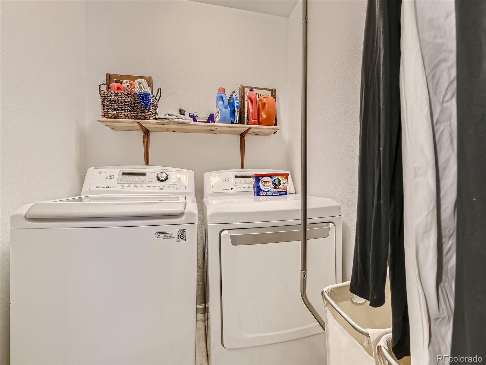 219 South Kellerman Street Aurora, CO 80018 - Photo 23 of 28 a utility room with dryer and washer