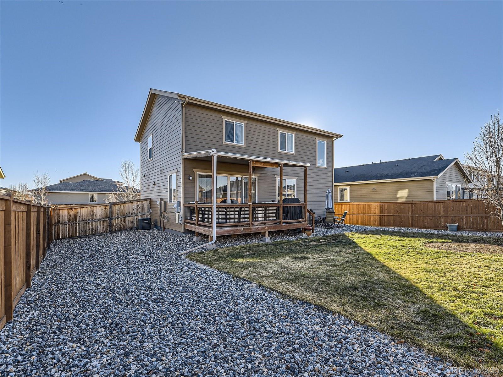 219 South Kellerman Street Aurora, CO 80018 - Photo 25 of 28 a view of a house with a yard