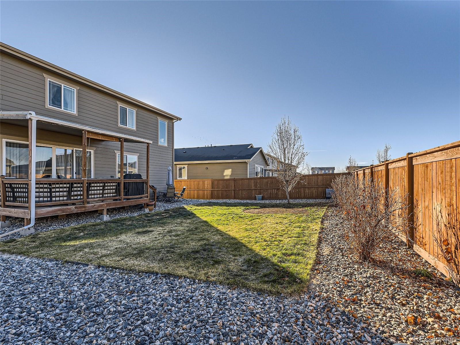 219 South Kellerman Street Aurora, CO 80018 - Photo 26 of 28 a view of a house with backyard