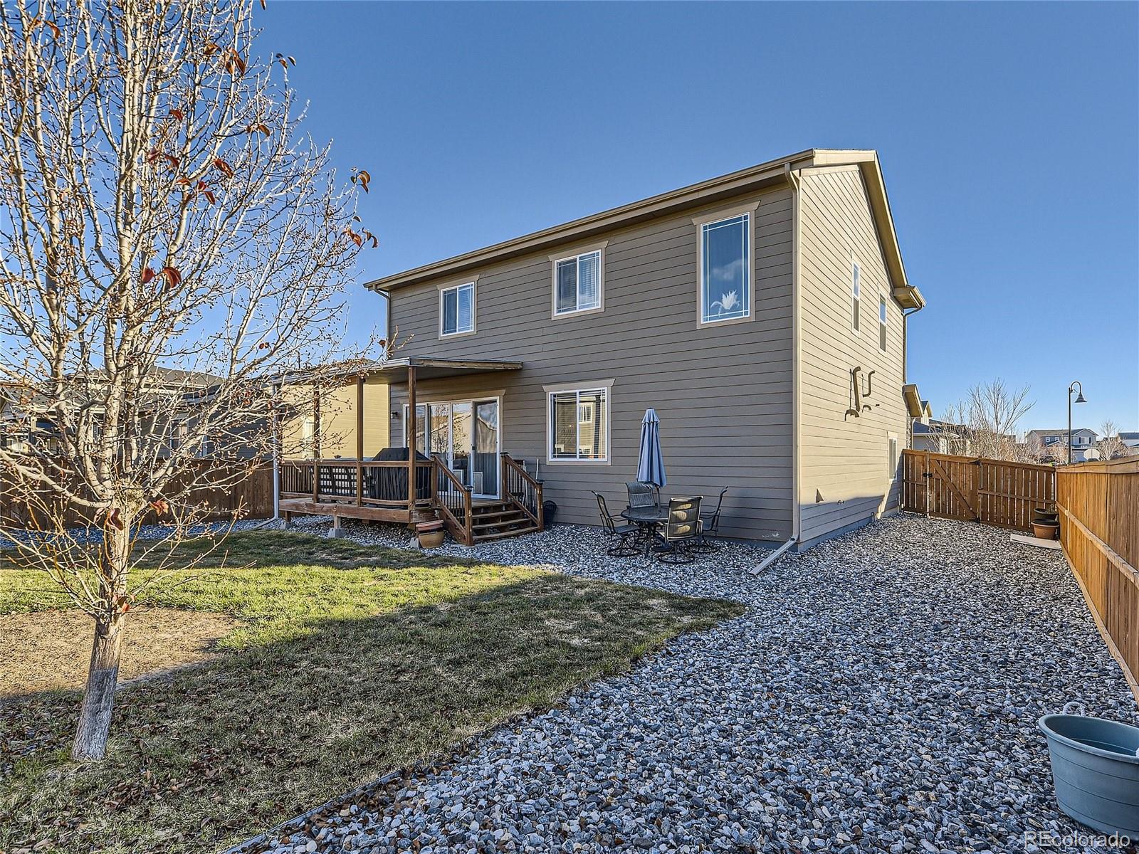 219 South Kellerman Street Aurora, CO 80018 - Photo 28 of 28 a view of a house with backyard