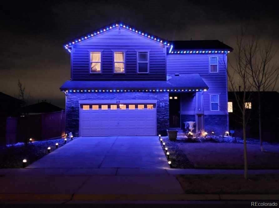 219 South Kellerman Street Aurora, CO 80018 - Photo 4 of 28 a view of a building with potted plants
