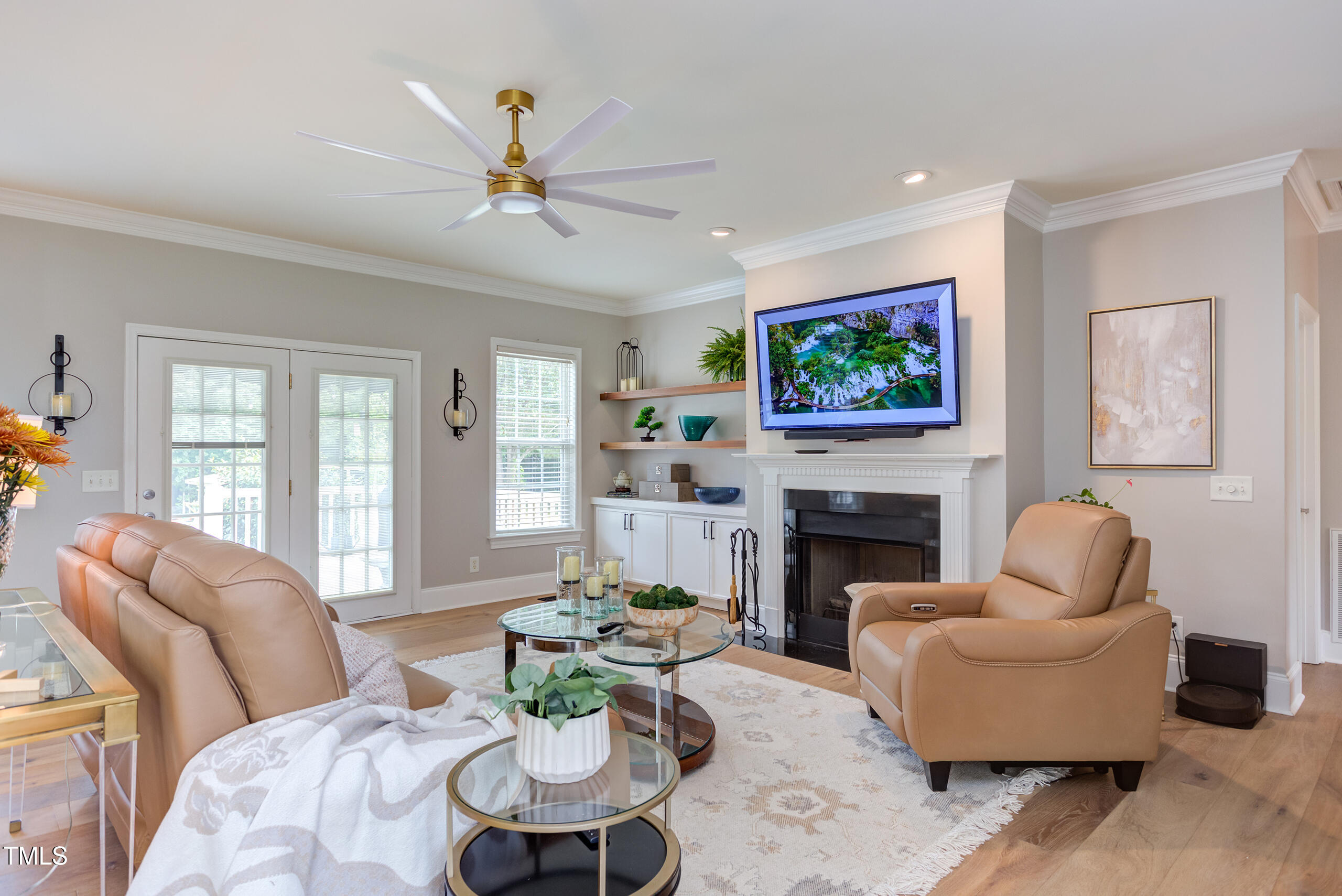 4191 Bobbitt Road Kittrell, NC 27544 - Photo 14 of 89 a living room with furniture a fireplace and a flat screen tv