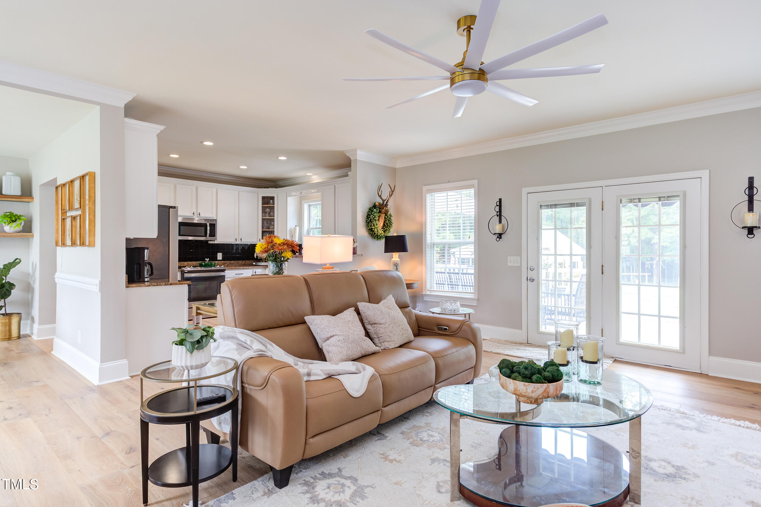 4191 Bobbitt Road Kittrell, NC 27544 - Photo 16 of 89 a living room with furniture kitchen and a chandelier