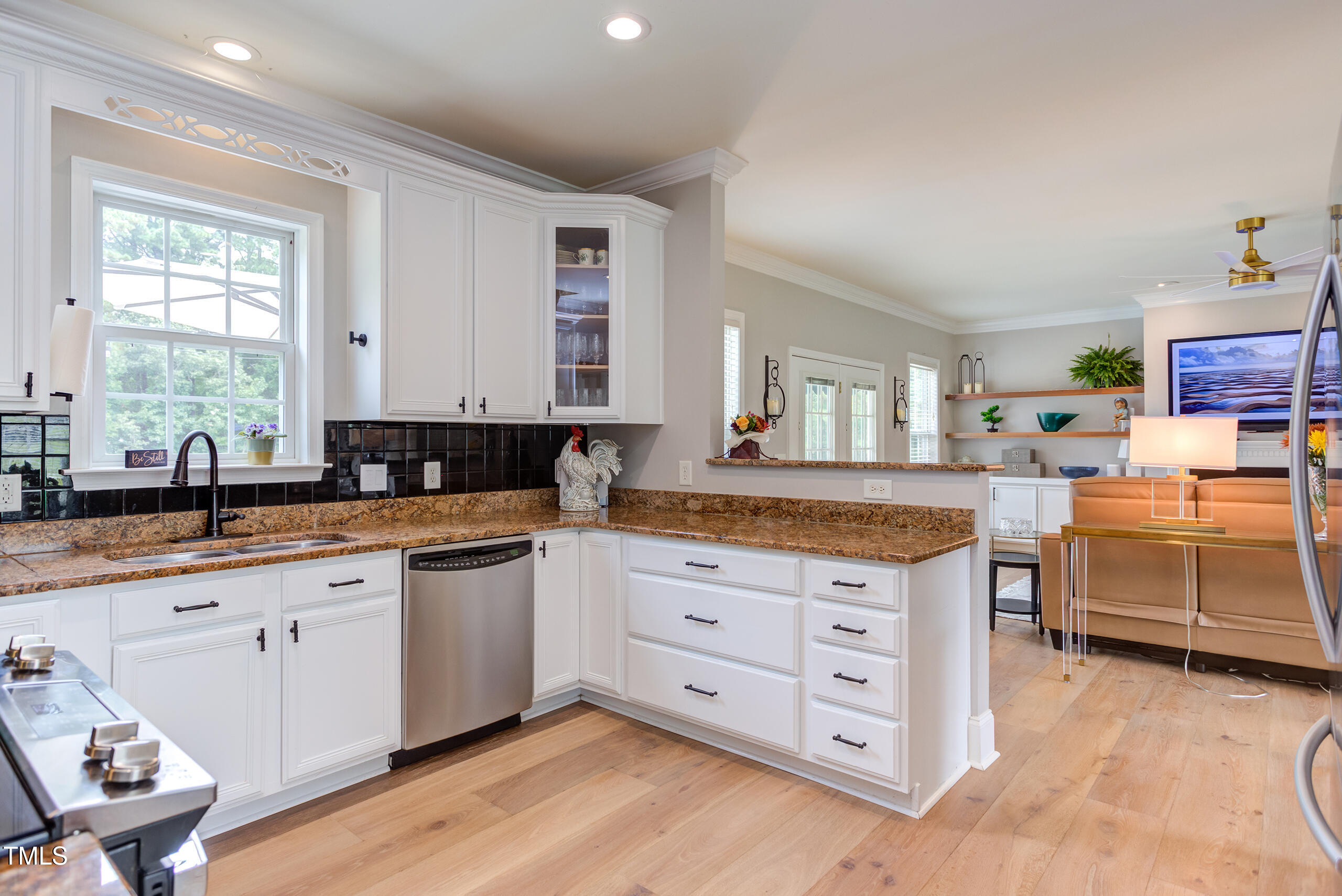 4191 Bobbitt Road Kittrell, NC 27544 - Photo 18 of 89 a kitchen with cabinets a sink and appliances in it