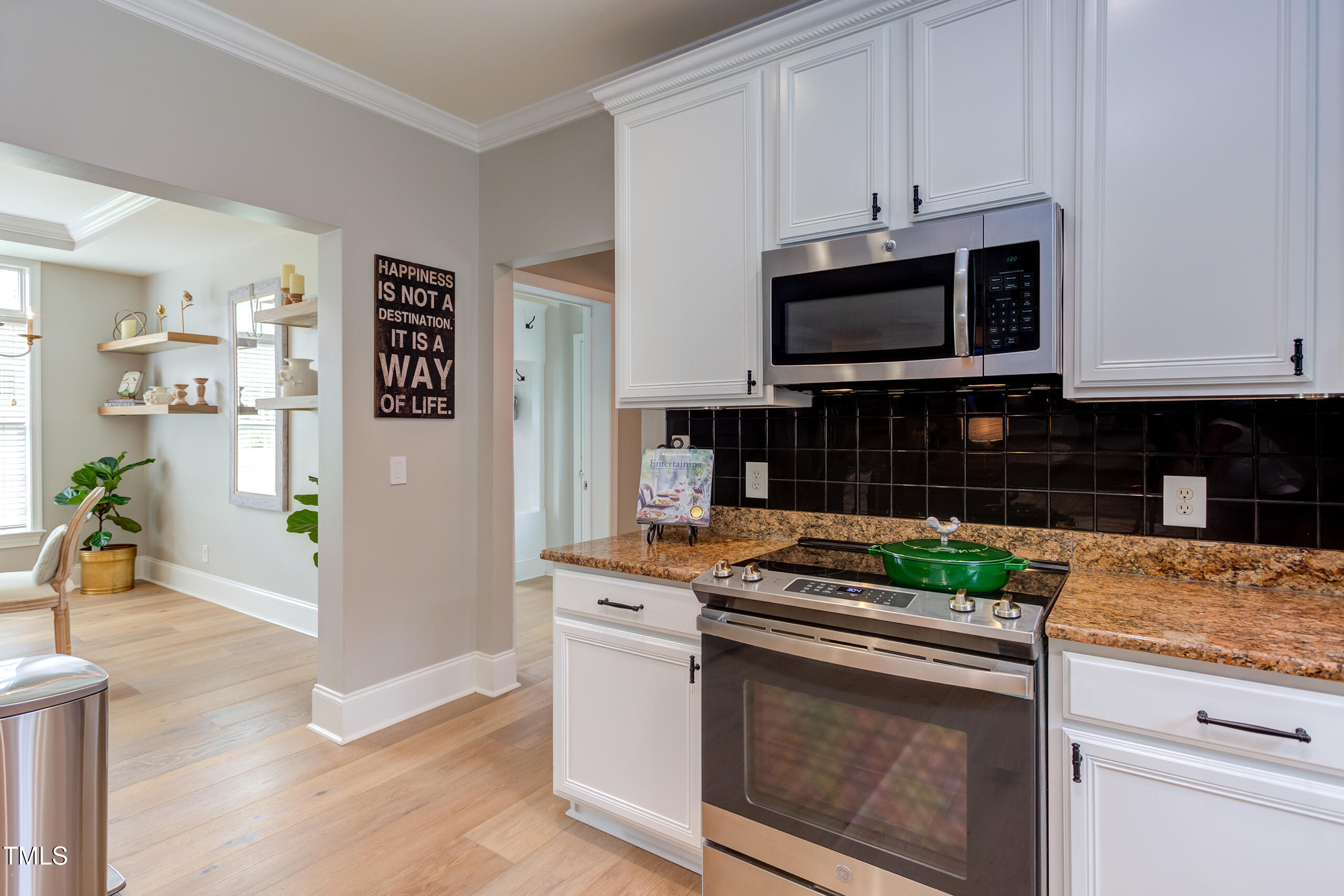 4191 Bobbitt Road Kittrell, NC 27544 - Photo 23 of 89 a kitchen with stainless steel appliances granite countertop a stove and a microwave